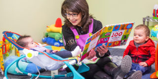 Babies being read to